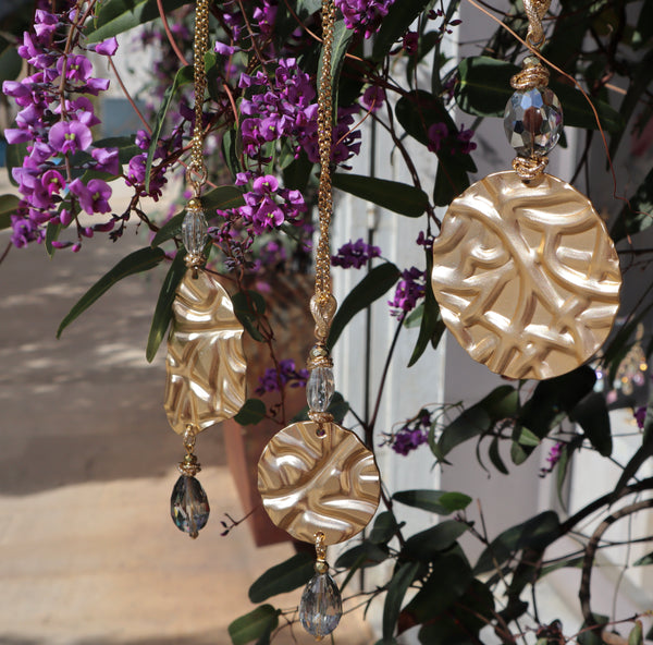 Collana con  pendete alluminio e cristalli