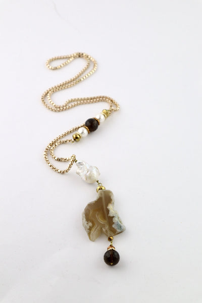 Collana lunga in alluminio dorato con pendente
